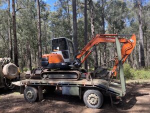 Excavator & 12-ton trailer